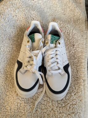 adidas White Sneakers with Black Accents and Pink Heel